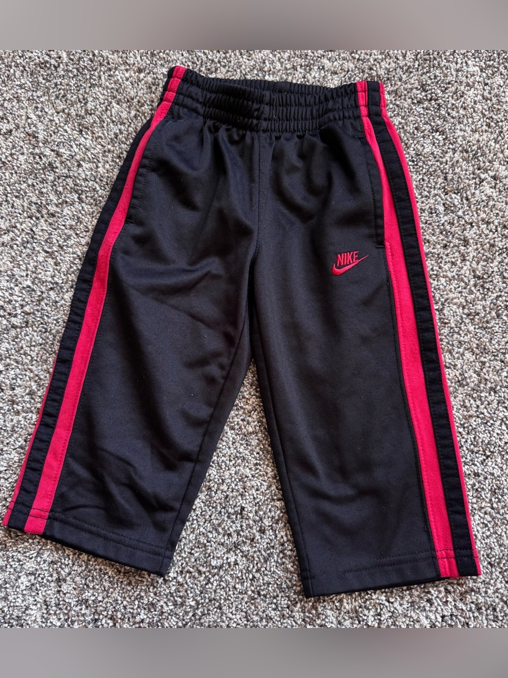 Nike Black Baby Joggers with Red Side Stripes